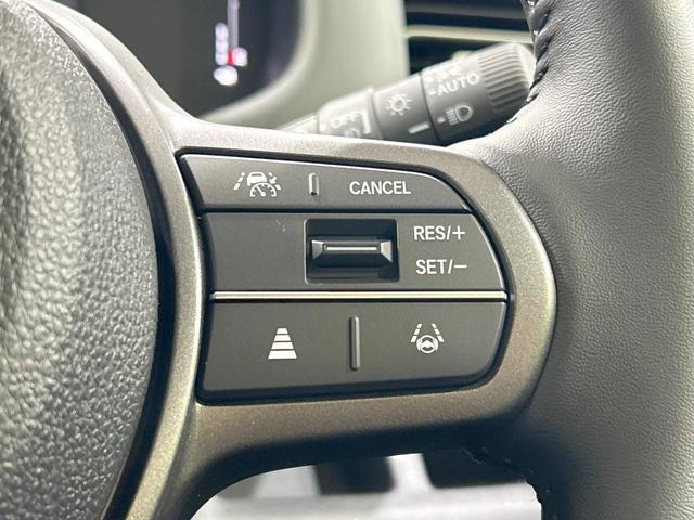 フリード クロスター 登録済未使用車 両側電動スライドドア ホンダセンシング ハーフレザーシート ブラインドスポットモニター レーンキープ スマートキー LEDヘッド ルーフレール 純正15インチAW オートハイビーム(34枚目)