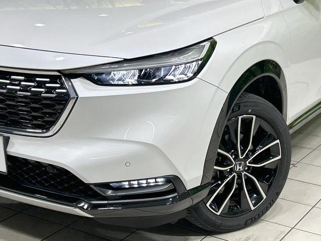 ヴェゼル e:HEV Z 純正9型ナビ バックカメラ 衝突被害軽減システム レーダークルーズ 禁煙車 電動リアゲート ハーフレザーシート スマートキー LEDヘッド ビルトインETC 純正18インチアルミ オートライト(12枚目)