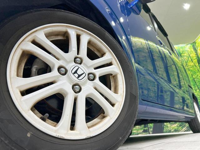 N-BOX 2トーンカラースタイル GターボSSパッケージ ターボ 両側電動スライド SDナビ 後席モニター バックカメラ シティブレーキ 禁煙車 シートヒーター スマートキー HIDヘッド ETC クルコン オートライト 純正14インチAW CD/DVD再生(13枚目)