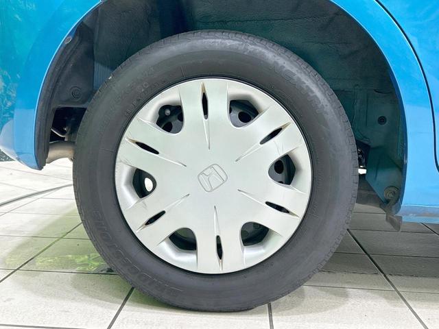 フィット Ｇ　禁煙車　ＣＤオーディオ　キーレスエントリー　エアコン　電動ドアミラー　バニティミラー　ＡＵＸ接続　パワーウィンドウ　衝突安全ボディ　ドアバイザー　盗難防止システム　パワーステアリング（25枚目）