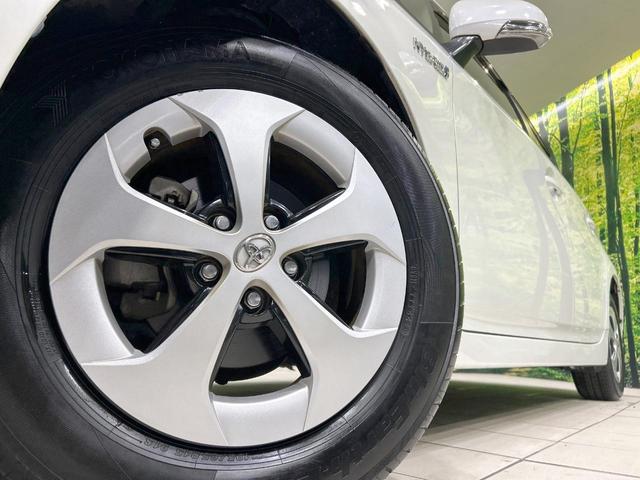 プリウス Ｇ　８型ナビ　バックカメラ　クルーズコントロール　禁煙車　パワーシート　ＥＴＣ　Ｂｌｕｅｔｏｏｔｈ再生　ＨＩＤヘッド　ハーフレザーシート　オートエアコン　純正１５インチＡＷ　純正革巻きステアリング（13枚目）