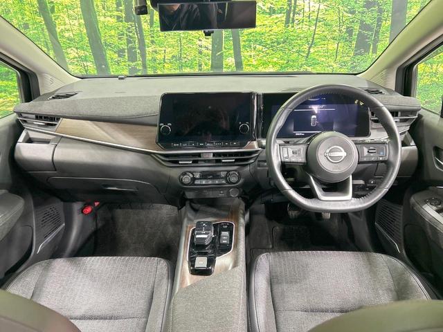 オーラ Ｇ　純正９型ナビ　全周囲カメラ　ＢＯＳＥサウンドシステム　寒冷地仕様　エマージェンシーブレーキ　プロパイロット　禁煙車　ハーフレザーシート　シートヒーター　スマートキー　ＬＥＤヘッド　ステアリングヒーター（2枚目）