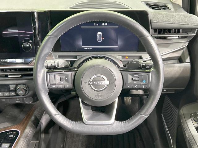 オーラ Ｇ　純正９型ナビ　全周囲カメラ　ＢＯＳＥサウンドシステム　寒冷地仕様　エマージェンシーブレーキ　プロパイロット　禁煙車　ハーフレザーシート　シートヒーター　スマートキー　ＬＥＤヘッド　ステアリングヒーター（11枚目）