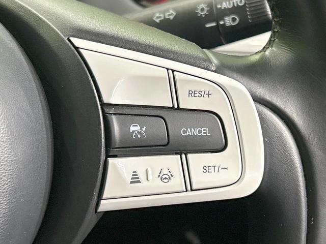 フィット ｅ：ＨＥＶホーム　純正９型ナビ　バックカメラ　ホンダセンシング　アダプティブクルーズ　禁煙車　Ｂｌｕｅｔｏｏｔｈ再生　ＥＴＣ　コーナーセンサー　ＬＥＤヘッド　オートライト　ハーフレザーシート　スマートキー（6枚目）