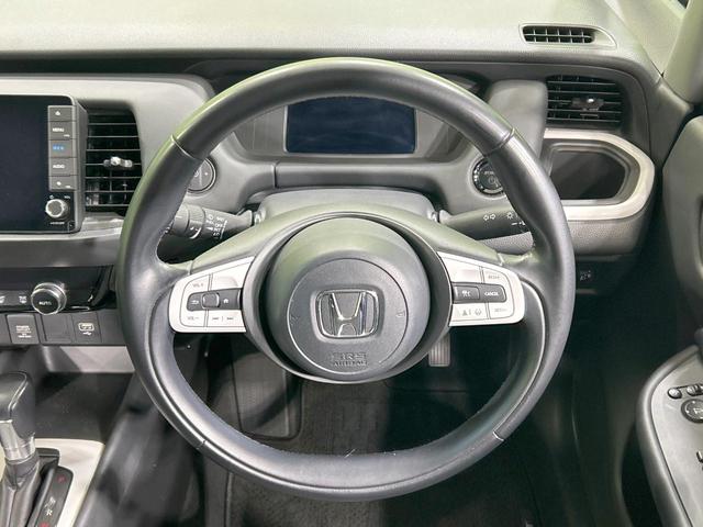 フィット ｅ：ＨＥＶホーム　純正９型ナビ　バックカメラ　ホンダセンシング　アダプティブクルーズ　禁煙車　Ｂｌｕｅｔｏｏｔｈ再生　ＥＴＣ　コーナーセンサー　ＬＥＤヘッド　オートライト　ハーフレザーシート　スマートキー（11枚目）