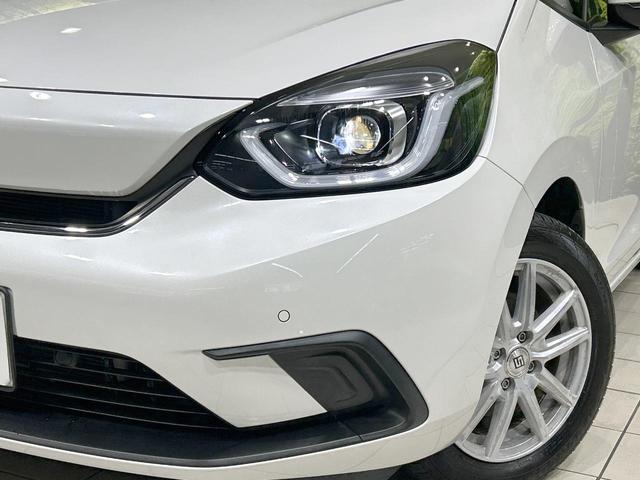 フィット ｅ：ＨＥＶホーム　純正９型ナビ　バックカメラ　ホンダセンシング　アダプティブクルーズ　禁煙車　Ｂｌｕｅｔｏｏｔｈ再生　ＥＴＣ　コーナーセンサー　ＬＥＤヘッド　オートライト　ハーフレザーシート　スマートキー（12枚目）