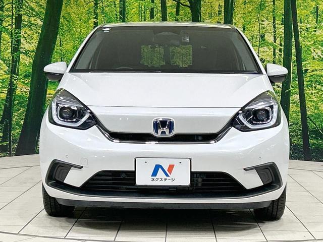 フィット ｅ：ＨＥＶホーム　純正９型ナビ　バックカメラ　ホンダセンシング　アダプティブクルーズ　禁煙車　Ｂｌｕｅｔｏｏｔｈ再生　ＥＴＣ　コーナーセンサー　ＬＥＤヘッド　オートライト　ハーフレザーシート　スマートキー（14枚目）