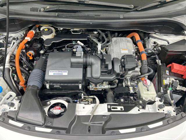 フィット ｅ：ＨＥＶホーム　純正９型ナビ　バックカメラ　ホンダセンシング　アダプティブクルーズ　禁煙車　Ｂｌｕｅｔｏｏｔｈ再生　ＥＴＣ　コーナーセンサー　ＬＥＤヘッド　オートライト　ハーフレザーシート　スマートキー（18枚目）