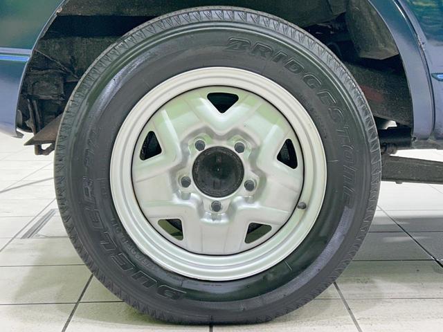 ジムニー ＸＧ　ターボ　禁煙車　ＥＴＣ　ＣＤ再生　リモコンキー　ドアバイザー　プライバシーガラス　盗難防止システム　衝突安全ボディ　パワーウィンドウ　リアワイパー（28枚目）