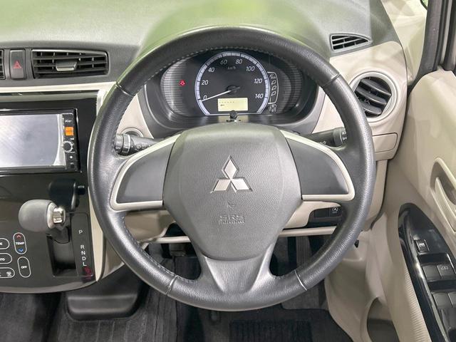 ｅＫワゴン Ｇ　純正ナビ　バックカメラ　禁煙車　Ｂｌｕｅｔｏｏｔｈ接続　ＨＩＤヘッド　革巻きステアリング　スマートキー　オートエアコン　フロントフォグランプ　純正革巻きステアリング　盗難防止システム　電動格納ミラー（11枚目）