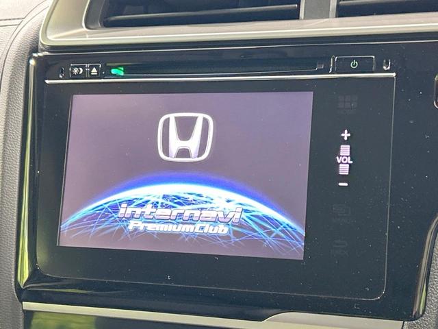 フィットハイブリッド Lパッケージ 純正ナビ バックカメラ シティブレーキ クルーズコントロール 禁煙車 ETC Bluetooth再生 ハーフレザーシート LEDヘッド オートライト オートエアコン スマートキー 革巻きステアリング(3枚目)