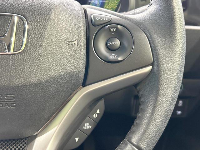 フィットハイブリッド Lパッケージ 純正ナビ バックカメラ シティブレーキ クルーズコントロール 禁煙車 ETC Bluetooth再生 ハーフレザーシート LEDヘッド オートライト オートエアコン スマートキー 革巻きステアリング(7枚目)