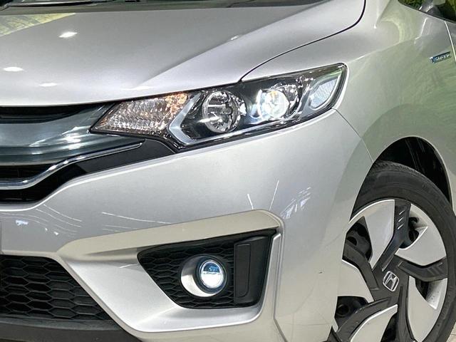 フィットハイブリッド Lパッケージ 純正ナビ バックカメラ シティブレーキ クルーズコントロール 禁煙車 ETC Bluetooth再生 ハーフレザーシート LEDヘッド オートライト オートエアコン スマートキー 革巻きステアリング(12枚目)