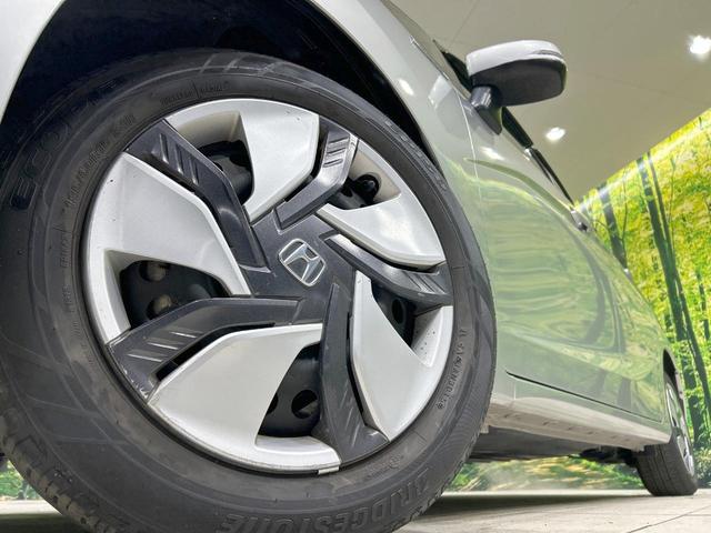 フィットハイブリッド Lパッケージ 純正ナビ バックカメラ シティブレーキ クルーズコントロール 禁煙車 ETC Bluetooth再生 ハーフレザーシート LEDヘッド オートライト オートエアコン スマートキー 革巻きステアリング(13枚目)