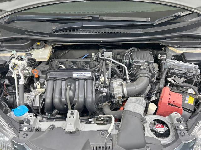 フィットハイブリッド Lパッケージ 純正ナビ バックカメラ シティブレーキ クルーズコントロール 禁煙車 ETC Bluetooth再生 ハーフレザーシート LEDヘッド オートライト オートエアコン スマートキー 革巻きステアリング(18枚目)