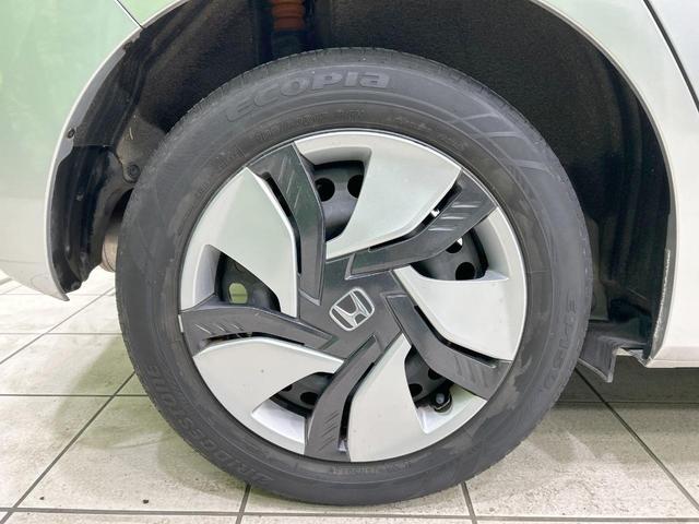 フィットハイブリッド Lパッケージ 純正ナビ バックカメラ シティブレーキ クルーズコントロール 禁煙車 ETC Bluetooth再生 ハーフレザーシート LEDヘッド オートライト オートエアコン スマートキー 革巻きステアリング(29枚目)