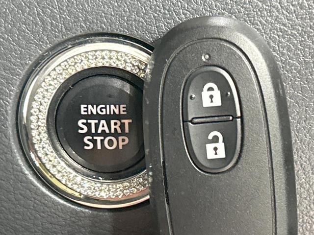 スペーシア G SDナビ 禁煙車 シートヒーター スマートキー 純正14インチアルミホイール オートエアコン CD再生 地デジ 電動格納ミラー アイドリングストップ パワーウィンドウ 両側スライドドア 盗難防止装置(4枚目)