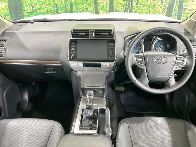 ランドクルーザープラド TX Lパッケージ マットブラックエディション 7人乗り サンルーフ 純正9型ナビ 全周囲カメラ 衝突軽減 レーダークルーズ 禁煙車 本革黒シート パワーシート シートヒーター クリアランスソナー レーンアシスト スマートキー デジミラ BSM(2枚目)