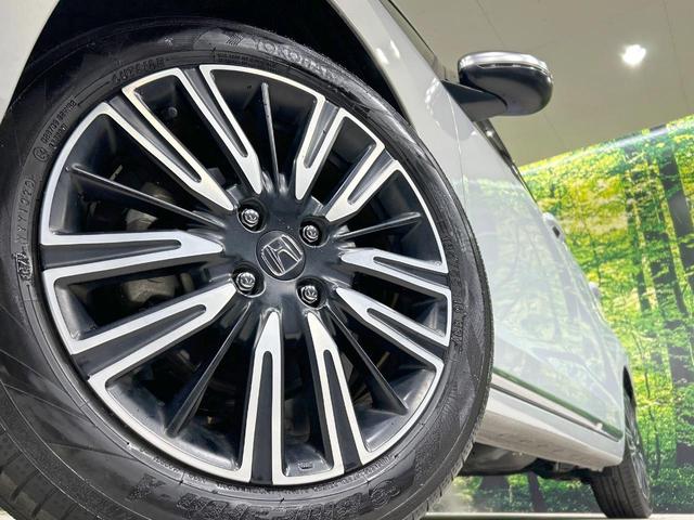 フィット e:HEVリュクス 純正9型ナビ バックカメラ ホンダセンシング 禁煙車 ハーフレザーシート 前席シートヒーター LEDヘッド&フォグ 純正16インチAW ステアリングヒーター コーナーセンサー ETC 置くだけ充電(13枚目)