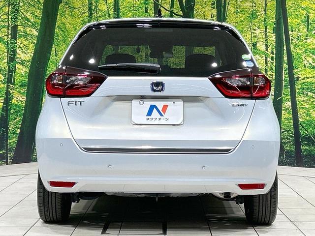 フィット e:HEVリュクス 純正9型ナビ バックカメラ ホンダセンシング 禁煙車 ハーフレザーシート 前席シートヒーター LEDヘッド&フォグ 純正16インチAW ステアリングヒーター コーナーセンサー ETC 置くだけ充電(15枚目)