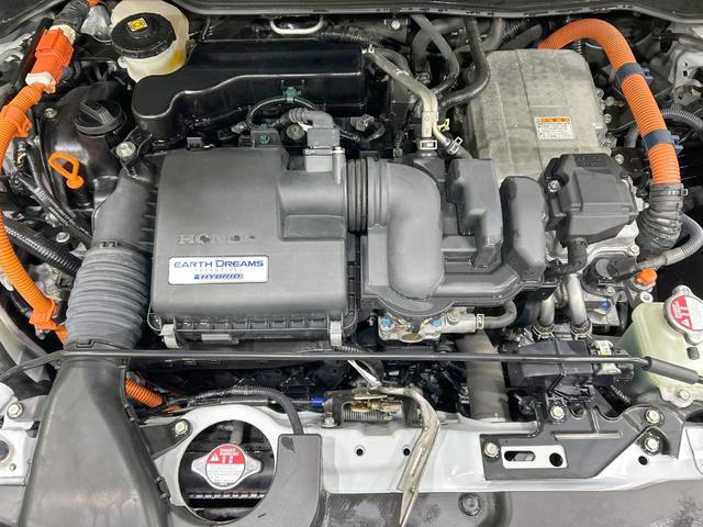 フィット e:HEVリュクス 純正9型ナビ バックカメラ ホンダセンシング 禁煙車 ハーフレザーシート 前席シートヒーター LEDヘッド&フォグ 純正16インチAW ステアリングヒーター コーナーセンサー ETC 置くだけ充電(18枚目)