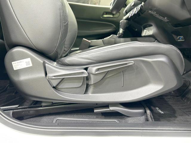 フィット e:HEVリュクス 純正9型ナビ バックカメラ ホンダセンシング 禁煙車 ハーフレザーシート 前席シートヒーター LEDヘッド&フォグ 純正16インチAW ステアリングヒーター コーナーセンサー ETC 置くだけ充電(38枚目)