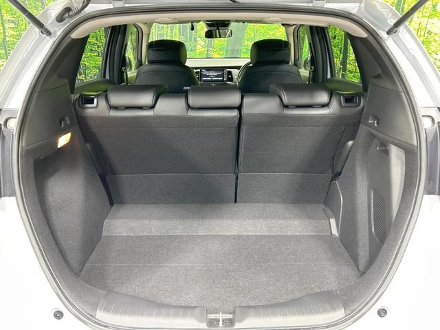 フィット e:HEVリュクス 純正9型ナビ バックカメラ ホンダセンシング 禁煙車 ハーフレザーシート 前席シートヒーター LEDヘッド&フォグ 純正16インチAW ステアリングヒーター コーナーセンサー ETC 置くだけ充電(42枚目)