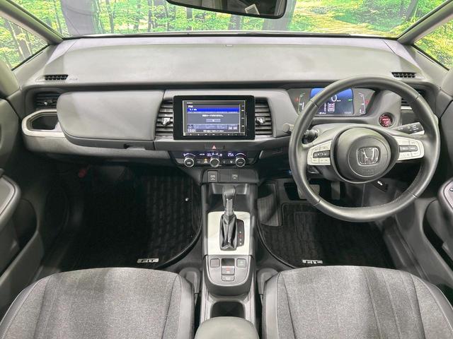 フィット e:HEVホーム バックカメラ ホンダセンシング アダプティブクルーズ 禁煙車 コーナーセンサー ハーフレザーシート ETC オートハイビーム 誤発進抑制機能 先行車発進告知機能 電動格納ミラー パワーウィンドウ(2枚目)