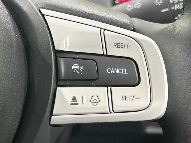 フィット e:HEVホーム バックカメラ ホンダセンシング アダプティブクルーズ 禁煙車 コーナーセンサー ハーフレザーシート ETC オートハイビーム 誤発進抑制機能 先行車発進告知機能 電動格納ミラー パワーウィンドウ(5枚目)