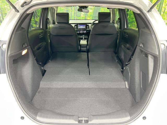 フィット e:HEVホーム バックカメラ ホンダセンシング アダプティブクルーズ 禁煙車 コーナーセンサー ハーフレザーシート ETC オートハイビーム 誤発進抑制機能 先行車発進告知機能 電動格納ミラー パワーウィンドウ(10枚目)