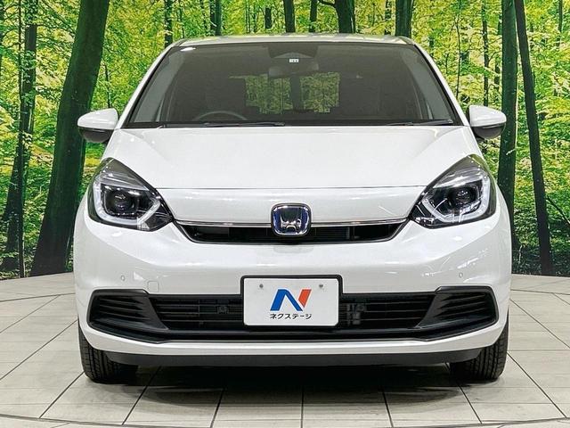 フィット e:HEVホーム バックカメラ ホンダセンシング アダプティブクルーズ 禁煙車 コーナーセンサー ハーフレザーシート ETC オートハイビーム 誤発進抑制機能 先行車発進告知機能 電動格納ミラー パワーウィンドウ(14枚目)