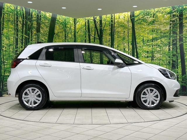 フィット e:HEVホーム バックカメラ ホンダセンシング アダプティブクルーズ 禁煙車 コーナーセンサー ハーフレザーシート ETC オートハイビーム 誤発進抑制機能 先行車発進告知機能 電動格納ミラー パワーウィンドウ(27枚目)