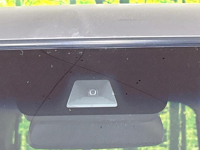 N-BOXカスタム G・EXターボホンダセンシング 両側パワスラ 純正ナビ バックカメラ ホンダセンシング アダプティブクルーズ 禁煙 ハーフレザーシート バックソナー レーンアシスト スマートキー LEDヘッド/フォグ オートハイビーム CD/DVD(6枚目)