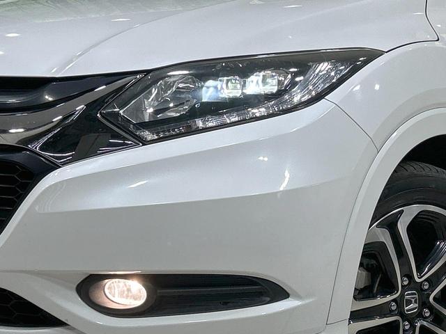 ヴェゼル ハイブリッドＺ　純正ナビ　バックカメラ　シティブレーキ　クルーズコントロール　禁煙車　前席シートヒーター　ＬＥＤヘッド　オートライト　ハーフレザーシート　ルーフレール　純正１７インチＡＷ　革巻きステアリング　ＥＴＣ（12枚目）