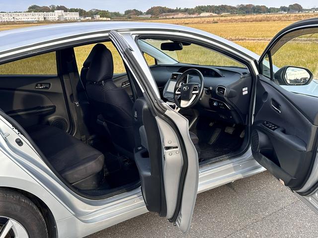 プリウス Ａ　平成２８年９月登録走行２５８２３ｋｍ型式ＤＡＡ－ＺＶＷ５１純正９インチナビフルセグテレビバックモニタークリアランストヨタセーフティセンス車検２０２７年９月色シルバーガソリン車（ＨＶ）５人乗り（12枚目）