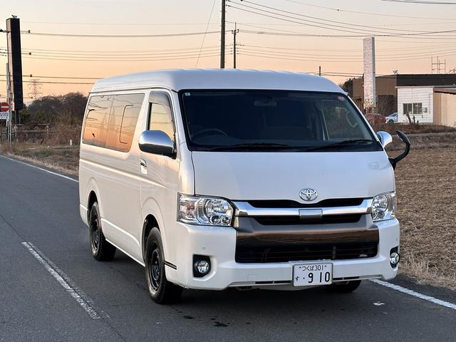 ハイエースワゴン スーパーロング　ハイエースワゴン年式：平成２６年２月登録走行２４９３３６ｋｍ車検Ｒ９年２月色白ハンドル右１０人乗り長い車検フリップダウンモニター純正ナビテレビあり車内綺麗です禁煙車ペット歴なし（2枚目）