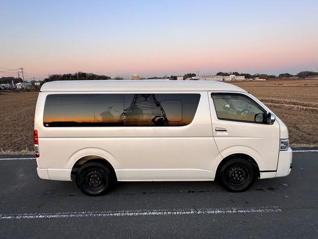 ハイエースワゴン スーパーロング　ハイエースワゴン年式：平成２６年２月登録走行２４９３３６ｋｍ車検Ｒ９年２月色白ハンドル右１０人乗り長い車検フリップダウンモニター純正ナビテレビあり車内綺麗です禁煙車ペット歴なし（8枚目）