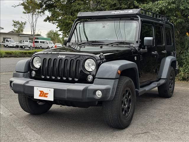 ジープ・ラングラーアンリミテッド スポーツ　４ＷＤ　８型フルセグナビ　ＢＴ　Ｂモニ　サイドカメラ　ＥＴＣ　ドラレコ　クルコン　ルーフキャリア　ヒッチメンバー　背面タイヤ　社外ＡＷ　フォグ　レベライザー　スタッドレスＴ　シートリフター　マット（22枚目）