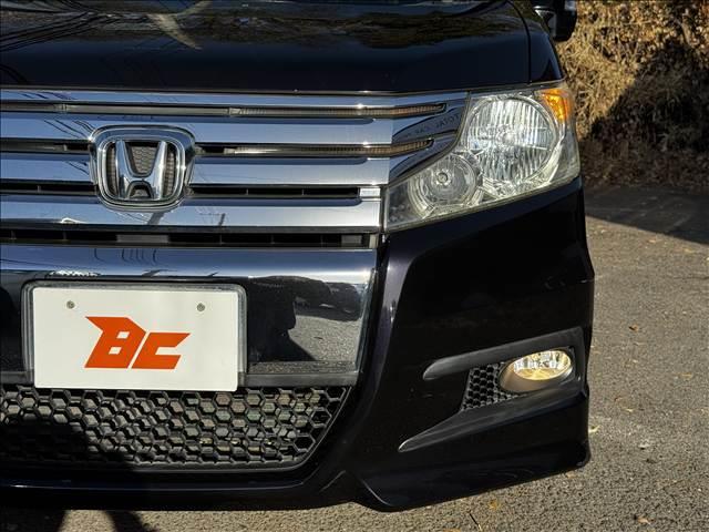 ステップワゴンスパーダ Ｓ　地デジナビ　Ｂモニター　電スラ　ＥＴＣ　キーレス　パドルシフト　ＨＩＤヘッド　フォグ　Ａライト　プライバシーガラス　フロアマット　ドアバイザー　電格ミラー　革巻ステア　チルトステア　シートリフター（33枚目）