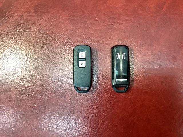 N-WGN G・Lパッケージ 地デジTV ナビTV サイドエアバッグ Aストップ VSA バックカメラ スマートキー オートエアコン USB ETC付き DVD 運転席助手席エアバッグ キーフリー ABS(35枚目)