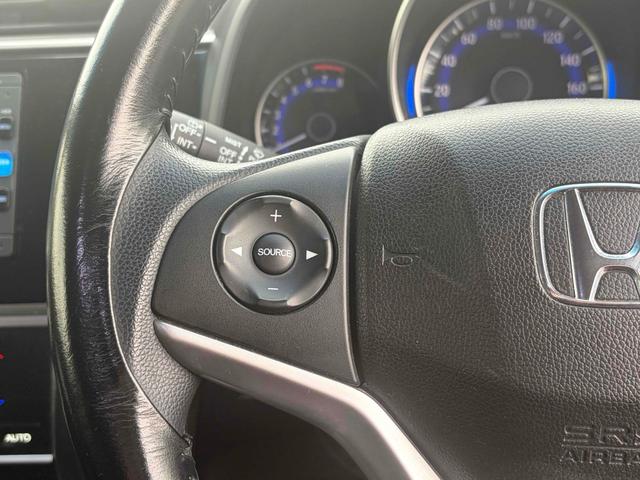 フィット 13G・Lパッケージ ETC バックカメラ ナビ TV オートクルーズコントロール 衝突被害軽減システム アルミホイール オートライト LEDヘッドランプ スマートキー アイドリングストップ 電動格納ミラー フルフラット(26枚目)