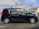 フリード Ｇ・ホンダセンシング　社外ナビＴＶ　バックカメラ　ホンダセンシング　衝突軽減　レーダークルーズ　レーンキープ　両側パワースライドドア　ＥＴＣ　スマートキー　ロールサンシェード　オートヘッドライト　６人乗り　１オーナー　禁煙（7枚目）
