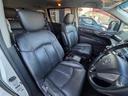 ライダー　黒本革シート　マニュアルシート　黒革／社外ナビ／地デジ／バックカメラ／両側電動スライドドア／オットマン／ＨＩＤヘッドライト／純正１８インチＡＷ／スマートキー／電動格納ミラー／（28枚目）