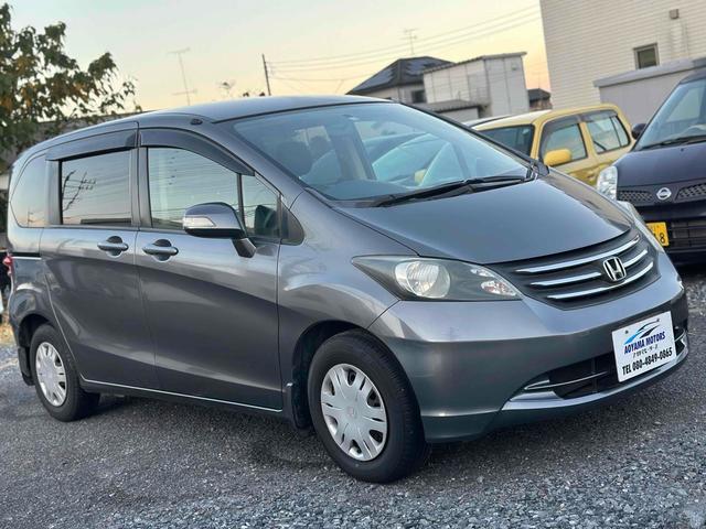 フリード フレックス Fパッケージ バックカメラ ナビ TV 両側スライド・片側電動 キーレスエントリー 電動格納ミラー ウォークスルー CVT CD DVD再生 衝突安全ボディ ABS エアコン パワーステアリング パワーウィンドウ(12枚目)