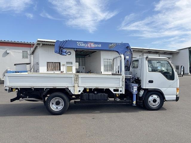 エルフトラック クレーン付平ボディ 上物タダノ製 4段ブーム ラジコン(無線) 2.6t吊り フックイン 荷台寸法371×180×38 標準ロングボディ 荷台床鉄板/板張り 積載2t アオリ5方開(4枚目)