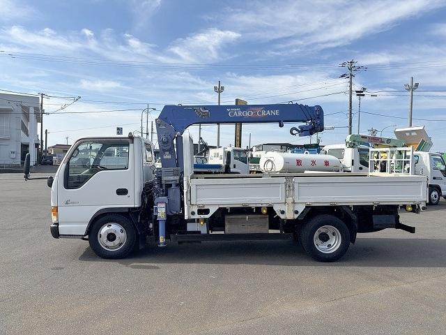 エルフトラック クレーン付平ボディ 上物タダノ製 4段ブーム ラジコン(無線) 2.6t吊り フックイン 荷台寸法371×180×38 標準ロングボディ 荷台床鉄板/板張り 積載2t アオリ5方開(5枚目)