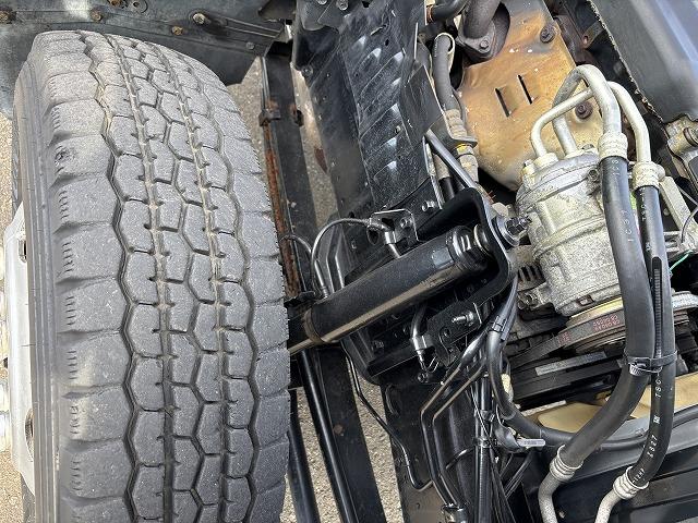 エルフトラック クレーン付平ボディ 上物タダノ製 4段ブーム ラジコン(無線) 2.6t吊り フックイン 荷台寸法371×180×38 標準ロングボディ 荷台床鉄板/板張り 積載2t アオリ5方開(63枚目)