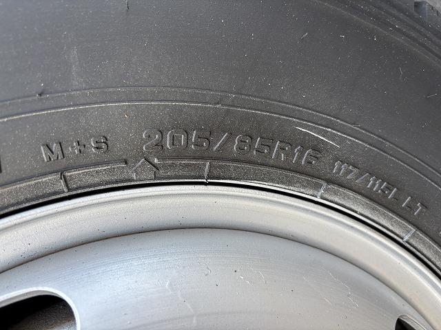 エルフトラック クレーン付平ボディ 上物タダノ製 4段ブーム ラジコン(無線) 2.6t吊り フックイン 荷台寸法371×180×38 標準ロングボディ 荷台床鉄板/板張り 積載2t アオリ5方開(65枚目)