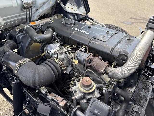 エルフトラック クレーン付平ボディ 上物タダノ製 4段ブーム ラジコン(無線) 2.6t吊り フックイン 荷台寸法371×180×38 標準ロングボディ 荷台床鉄板/板張り 積載2t アオリ5方開(69枚目)