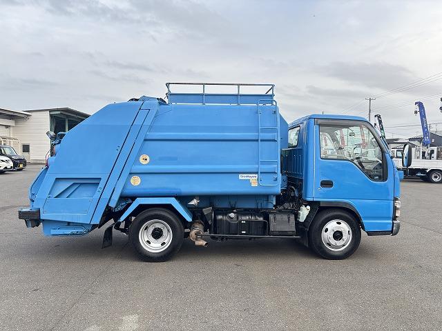 エルフトラック 塵芥車/パッカー車 プレス式 上物新明和製 容量4.2立米 積載2t 連続スイッチ 汚水タンク 走行7.8万km 5速ミッション(8枚目)
